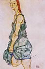 Standing Woman in a Green Skirt